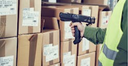 Worker with barcode scanner Worker with barcode scanner