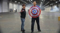 Grant Imahara (left) and Allen Pan show off their creations &mdash; a repulsor force Iron Man gauntlet and a boomeranging Captain America shield &mdash; as part of Mouser Electronics and Marvel Entertainment&rsquo;s Empowering Innovation Together series.