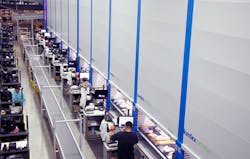 With 55 VLMs, Mouser has the largest installation of Vertical Lift Modules in North America. The automated towers — essentially giant vertical filing cabinets — store up to 120,000 parts and bring the parts to the employee workstations. With 55 VLMs, Mouser has the largest installation of Vertical Lift Modules in North America. The automated towers — essentially giant vertical filing cabinets — store up to 120,000 parts and bring the parts to the employee workstations.