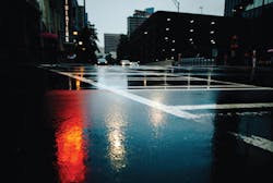 Black ice like this appears to be wetness or rain, but is actually slippery ice. Black ice like this appears to be wetness or rain, but is actually slippery ice.